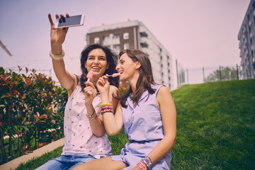 Two Girls making selfie, Outdoors, leisure concept