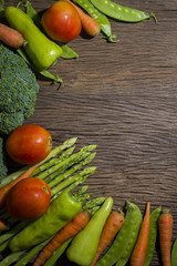 green vegetables on wood background