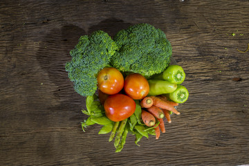 green vegetables on wood background
