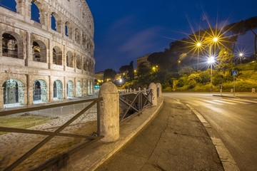 night lights and colosseum in Rome in Italy