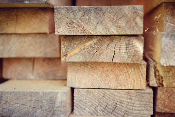 Stack of wooden bars. building material. Boards stacked