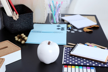 Office and school set with stationery and notebooks on a table