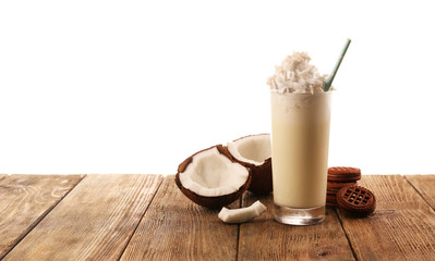 Delicious milkshake with coconut and cookies, isolated on white