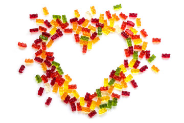 heart shape from gummy bears on a white background, love concept