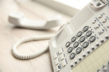 Office IP telephone on light background