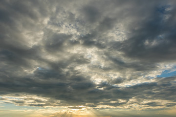 Obraz premium Dark storm clouds, Light in the dark and dramatic storm clouds