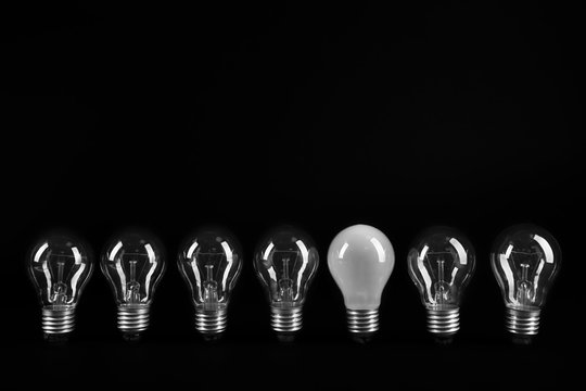 Electric bulbs on grey background