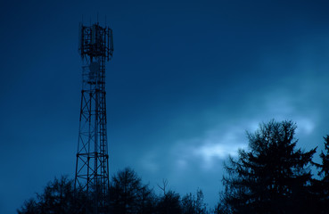 Blue sky with silhouette of transmitter