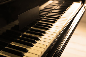Black and white piano keys, close up