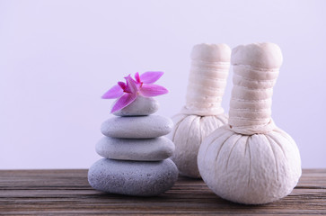 Spa composition with white stones on light background