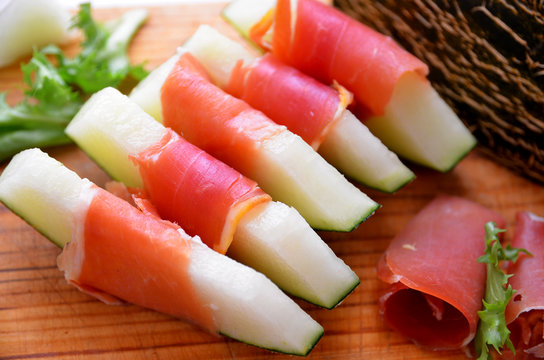 Spanish jamon with melon close up.Melon with serrano ham, a typical dish in Spain.