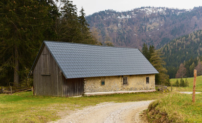 Alps cottage in April in rainy day