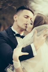 Kissing wedding couple