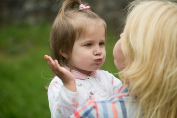 Happy mother with little girl