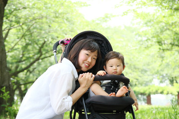 Walk of a baby and a young mother