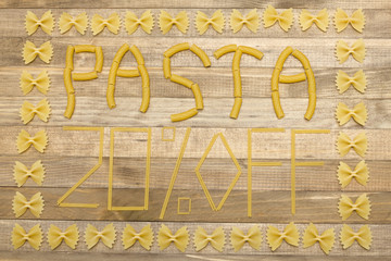 pasta  twenty percent off text made of raw pasta