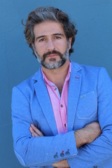Businessman in classic suit with salt and pepper hair 