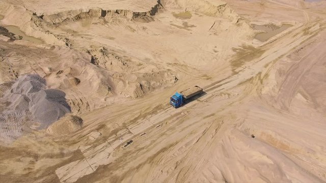 Aerial view of truck in sand quarry