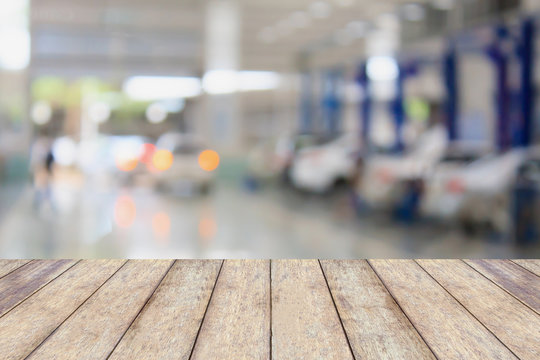 Wood Table Top With Blur Garage Background