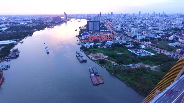 aerial view of bhumiphol bridge crossing chaopraya river important landmark and traffic and land transportation in bangkok thailand