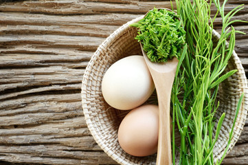 egg and acacia pennata prepare for omelet cooking