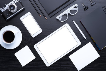 Office tools. Digital technology. Innovative implementation in business. Internet applications. Wireless function. Tablet phone and camera. Developing applications on the Internet. Flat lay photo