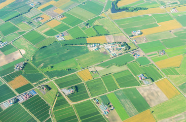 Aerial view from airplane of agriculture field in summer at chitose hokkaido japan - obrazy, fototapety, plakaty