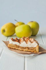 Apple pie with whipped cream covered by grated chocolate