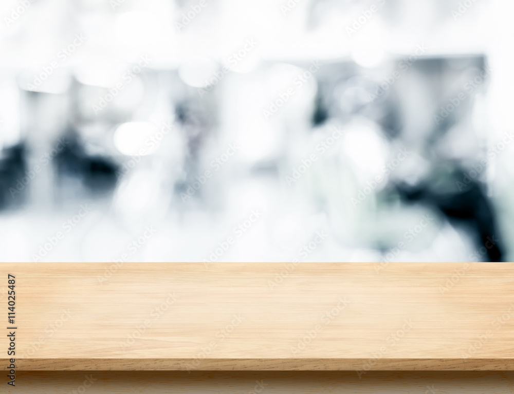 Aufkleber Empty wood table top with abstract blur background with bokeh li
