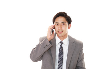 スマートフォンで通話中のビジネスマン