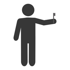 man holding toothbrush