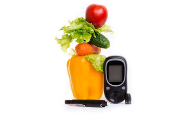 healthy organic food and a glucometer