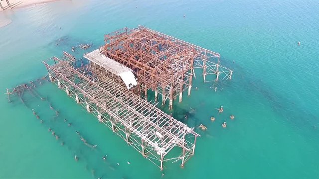 Aerial view of the remains of the derelict West pier in Brighton, England