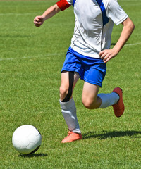 Young child with a soccer ball