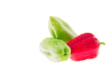 Group fresh peppers paprika with drops of water on a white background. Green and red bell peppers. Isolated. Food background. Copy space.