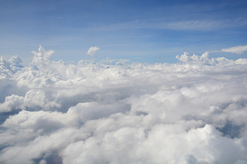 Fototapeta premium View from the window of an airplane flying in the clouds