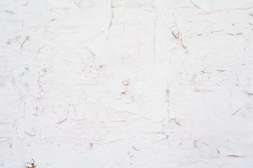 Fototapeta premium Aged white painted wall with subtle texture and cracks