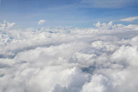 View from the window of an airplane flying in the clouds © kritiya