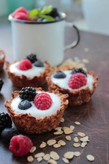 Oat tarts cookies with light yogurt and berries fruits