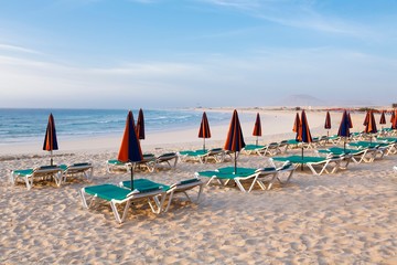 Sun loungers on beach