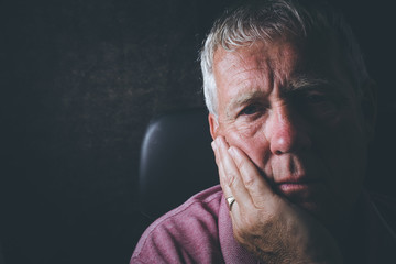 Older depressed man, selective focus,