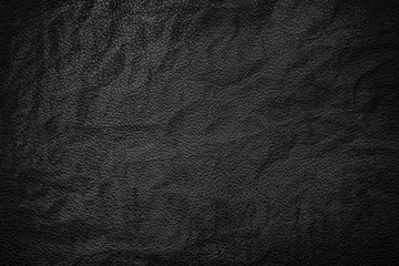 Black crumpled leather texture background