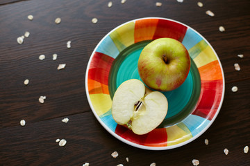 Oatmeal with milk, banana, apple and lemon