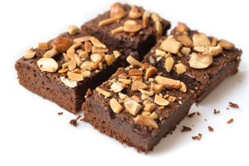 Many pieces of brownie on white background - isolated