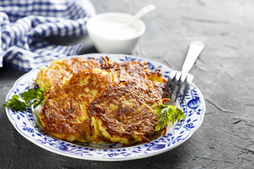 Potato pancakes with yogurt sauce