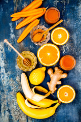 Carrot ginger immune boosting, anti inflammatory smoothie with turmeric and honey. Detox morning juice drink, clean eating