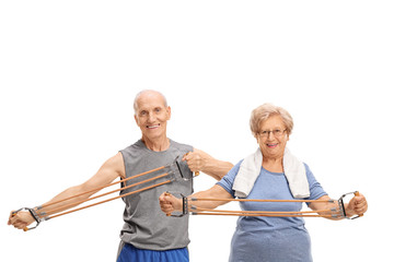 Senior man and woman exercising