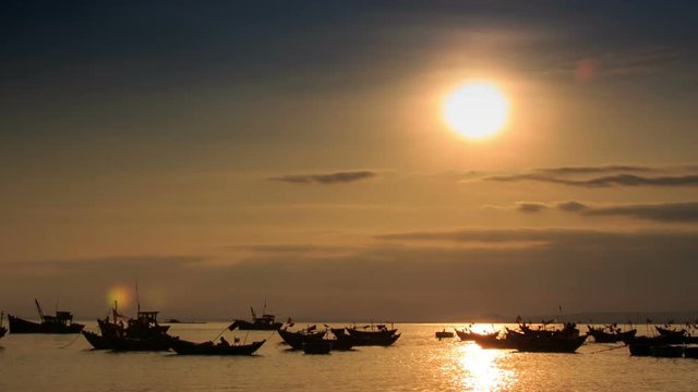 Fishing Boats in Sea Bay at Sunset in Vietnam under Sunpath