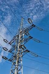 High-voltage tower sky background