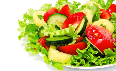 Fresh vegetable salad isolated on a white